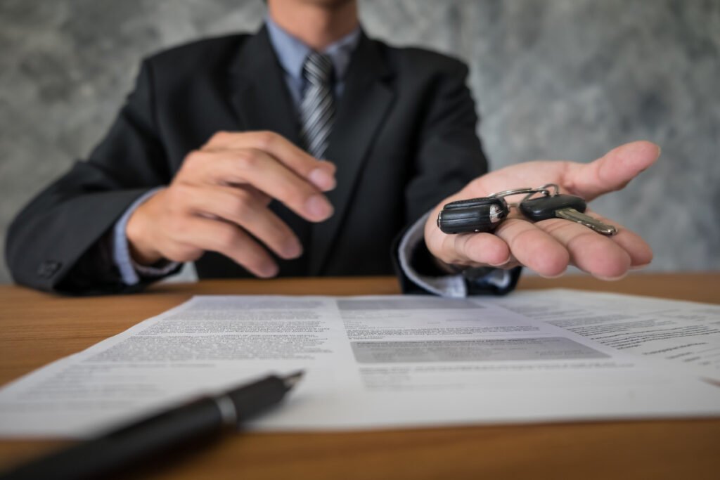 rachat voiture Belgique : signature contrat de vente